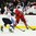 GRAND FORKS, NORTH DAKOTA - APRIL 19: Czech Republic's Matyas Kantner #27 plays the puck while Slovakia's Martin Krempasky #11 defends during preliminary round action at the 2016 IIHF Ice Hockey U18 World Championship. (Photo by Matt Zambonin/HHOF-IIHF Images)

